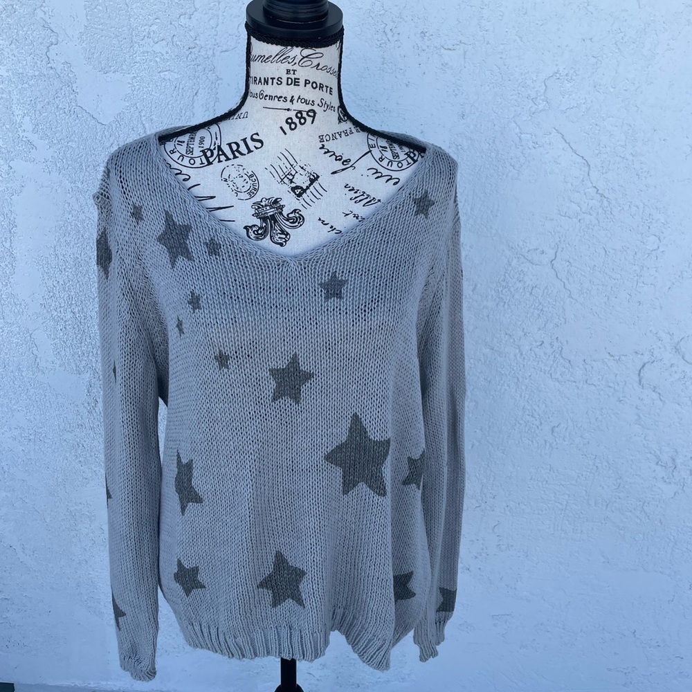 Wooden Ships sweater with star motif design